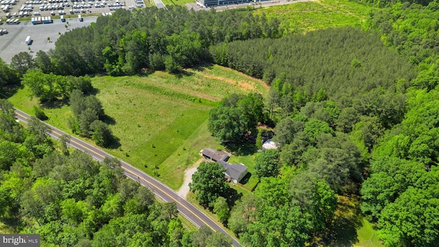 10439 Ashcake Rd, Ashland, VA 23005 - aerial view of property and surrounding area featuring a heavily wooded area