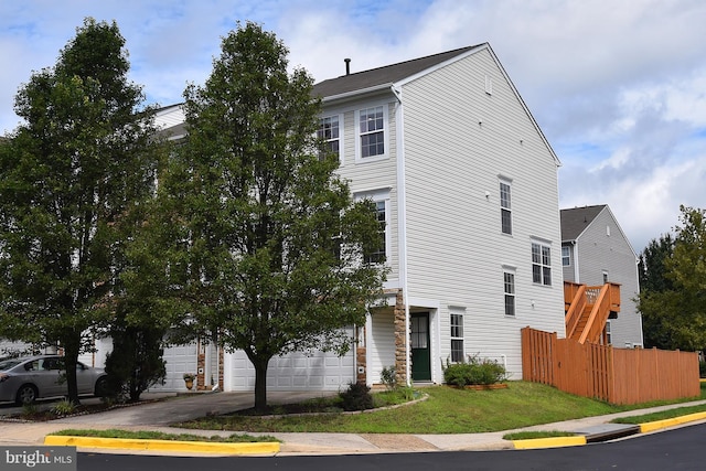 43696 Phelps Ter, Ashburn, VA 20147 - view of front facade featuring a garage and driveway