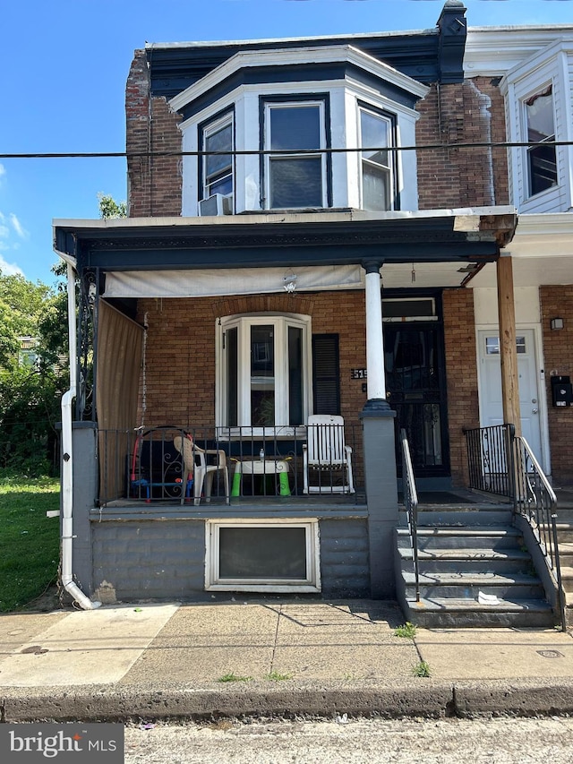 5152 Funston St, Philadelphia, PA 19139 - view of front of property with brick siding and covered porch