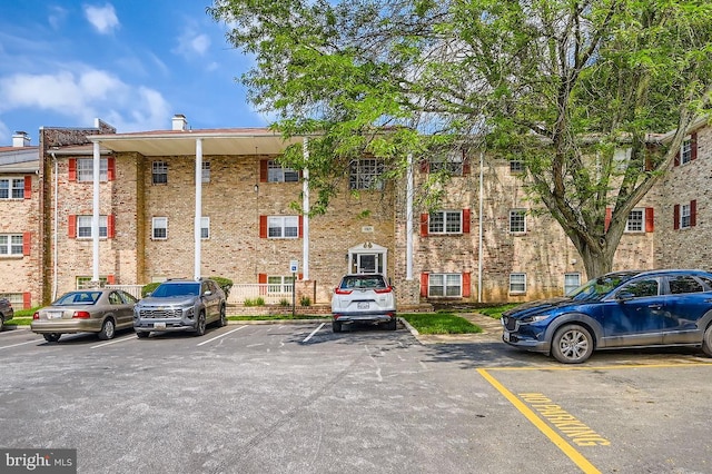 11921 Tarragon Rd Unit F, Reisterstown, MD 21136 - view of building exterior with uncovered parking