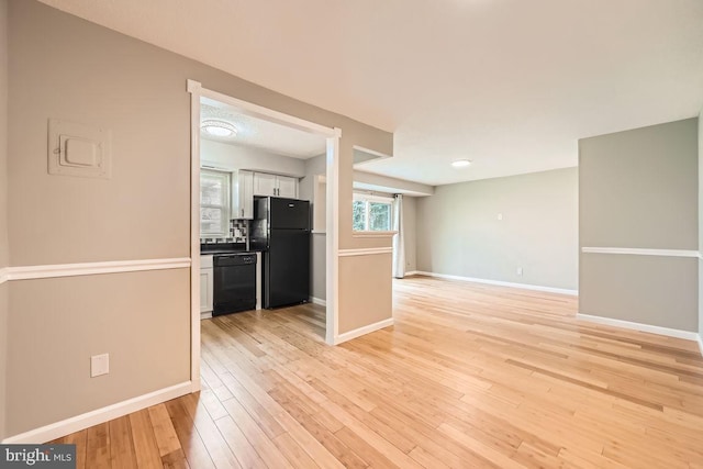11921 Tarragon Rd Unit F, Reisterstown, MD 21136 - empty room with light wood-style flooring and baseboards