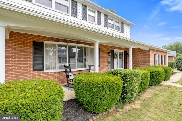 1965 Niagara Ln, York, PA 17408 - view of front facade with brick siding and a porch