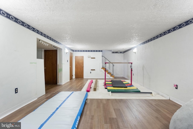 1965 Niagara Ln, York, PA 17408 - exercise area featuring wood finished floors and a textured ceiling