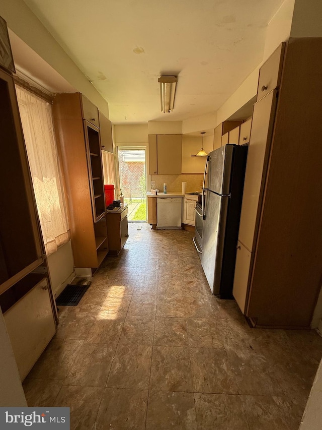 1738 Lancaster Ave, Wilmington, DE 19805 - kitchen with freestanding refrigerator, light countertops, dishwasher, and stove