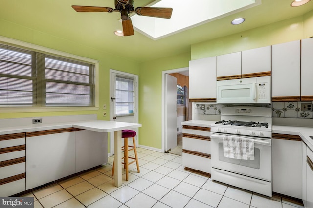 4901 Ashby St NW, Washington, DC 20007 - kitchen featuring white appliances, light countertops, recessed lighting, ceiling fan, and tasteful backsplash