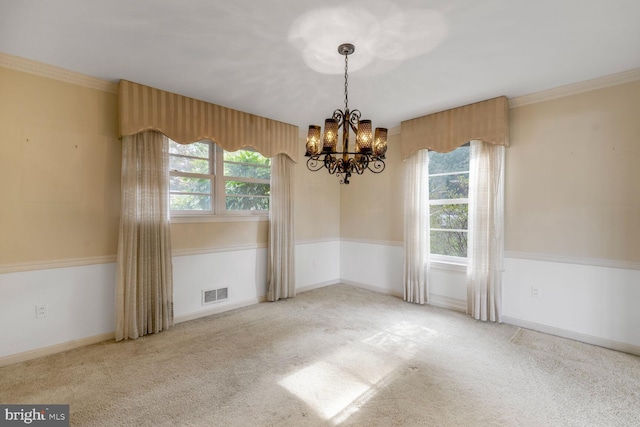 4901 Ashby St NW, Washington, DC 20007 - carpeted empty room with a chandelier and ornamental molding