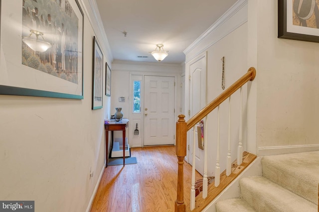 13663 Harvest Glen Way, Germantown, MD 20874 - entryway with light wood finished floors, stairs, and crown molding