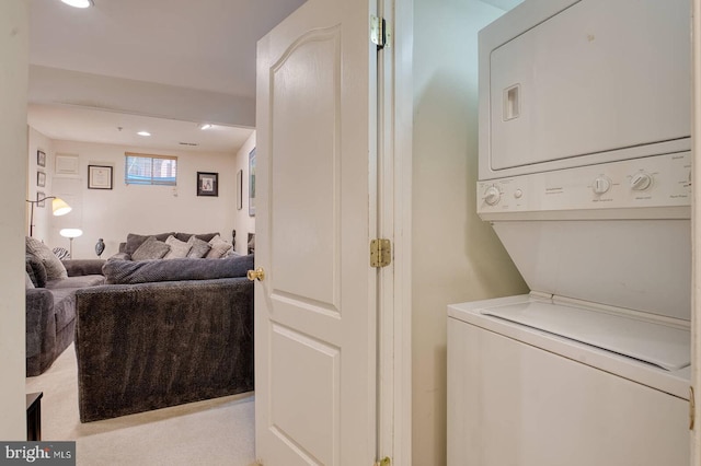 13663 Harvest Glen Way, Germantown, MD 20874 - laundry area featuring stacked washer / drying machine and recessed lighting