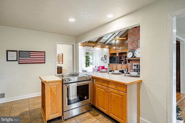 707 Pheasant Run, Kennett Square, PA 19348 - kitchen with stainless steel electric range, a ceiling fan, light countertops, recessed lighting, and open floor plan