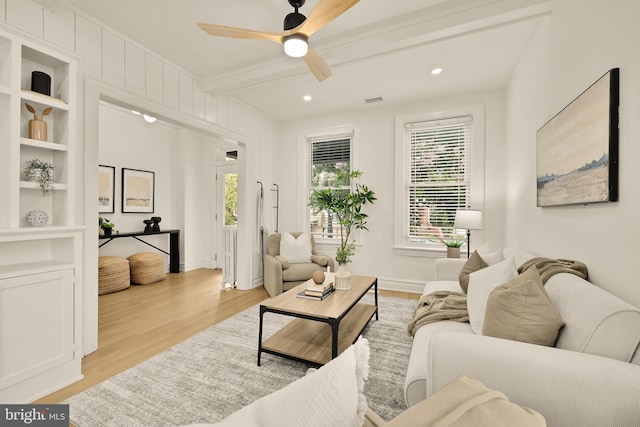 1371 Perry Pl NW, Washington, DC 20010 - living room featuring light wood-type flooring, a ceiling fan, beam ceiling, and recessed lighting