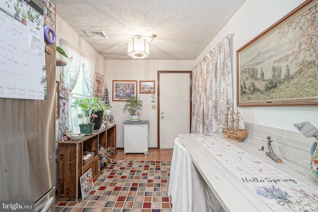 16 Pin Oak Dr, Atco, NJ 08004 - laundry room with a textured ceiling and wood finished floors