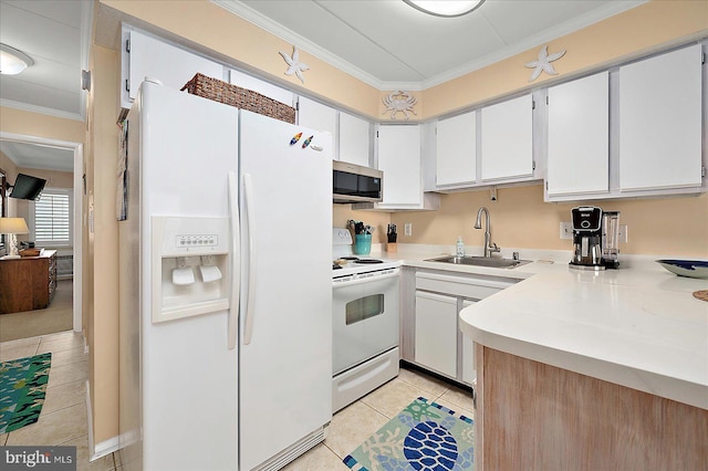 778 94th St Unit 205, Ocean City, MD 21842 - kitchen with white appliances, ornamental molding, light tile patterned flooring, light countertops, and white cabinetry