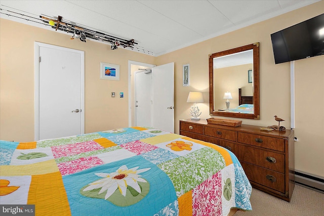 778 94th St Unit 205, Ocean City, MD 21842 - bedroom with a baseboard radiator and carpet