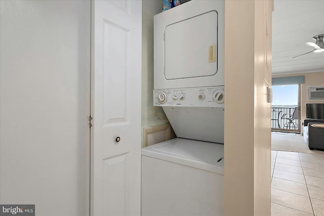 778 94th St Unit 205, Ocean City, MD 21842 - laundry area with stacked washer / drying machine, tile patterned flooring, and a wall mounted AC