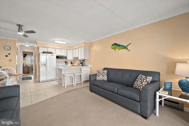 778 94th St Unit 205, Ocean City, MD 21842 - living area with ornamental molding, light tile patterned flooring, light colored carpet, and a ceiling fan