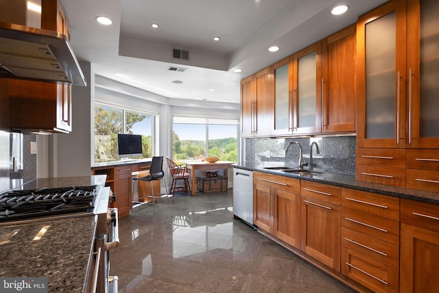 2230 California St NW Unit 5Cw, Washington, DC 20008 - kitchen featuring stainless steel dishwasher, extractor fan, granite floors, stove, and decorative backsplash