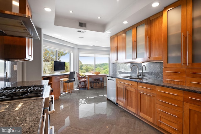 2230 California St NW Unit 5Cw, Washington, DC 20008 - kitchen featuring stainless steel dishwasher, exhaust hood, granite floors, range, and backsplash