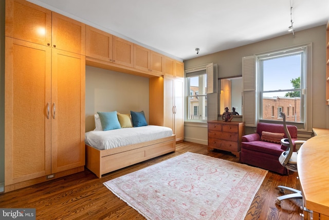 2230 California St NW Unit 5Cw, Washington, DC 20008 - bedroom with multiple windows and dark wood-style floors
