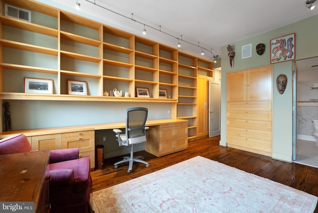 2230 California St NW Unit 5Cw, Washington, DC 20008 - home office featuring built in desk, track lighting, and dark wood finished floors