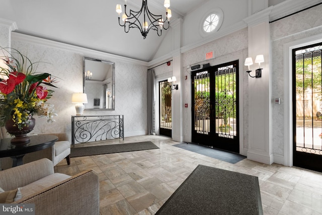 2230 California St NW Unit 5Cw, Washington, DC 20008 - foyer with a chandelier, wallpapered walls, and high vaulted ceiling