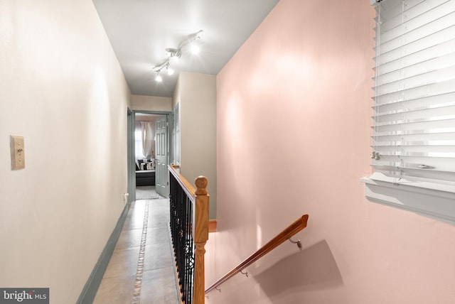 2515 17th St NE, Washington, DC 20018 - corridor featuring an upstairs landing, inlaid floor details, and tile patterned floors