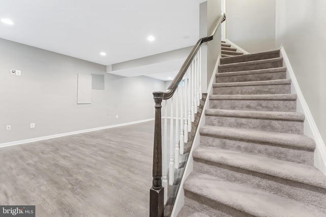 20152 Boxwood Pl, Ashburn, VA 20147 - staircase with recessed lighting and wood finished floors