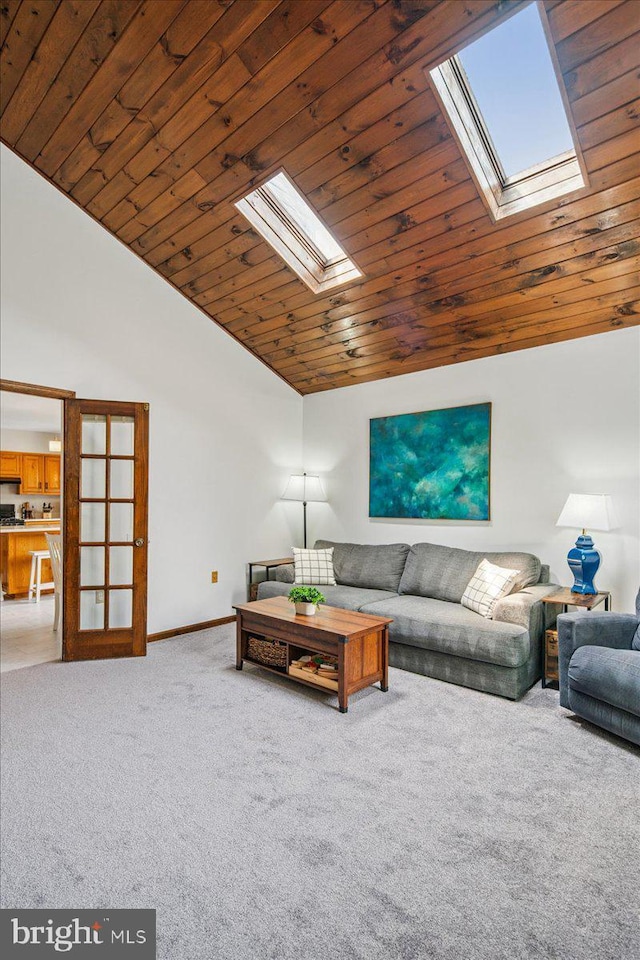 8 High Acres Dr, Ewing, NJ 08628 - living area featuring a skylight, vaulted ceiling, carpet floors, and wooden ceiling