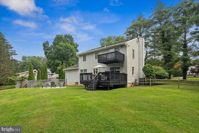 8 High Acres Dr, Ewing, NJ 08628 - rear view of property with a balcony, a fenced backyard, a chimney, and a wooden deck