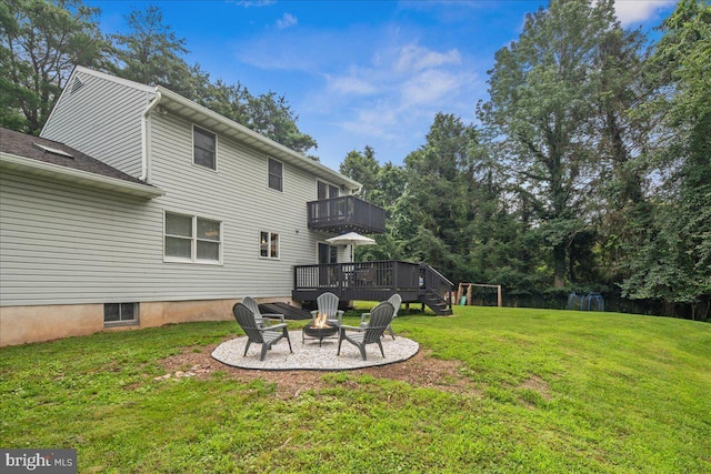 8 High Acres Dr, Ewing, NJ 08628 - view of green lawn featuring a fire pit, a patio, a deck, and a balcony