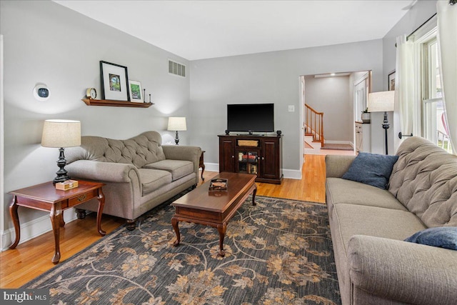 8 High Acres Dr, Ewing, NJ 08628 - living area with wood finished floors and stairs