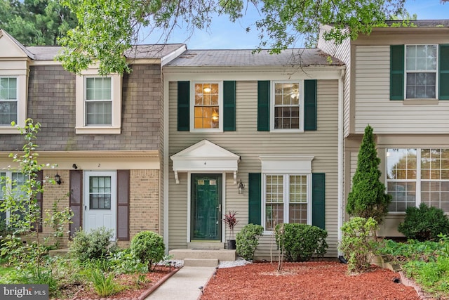 4 Habersham Ct, Silver Spring, MD 20906 - view of property featuring roof with shingles and brick siding