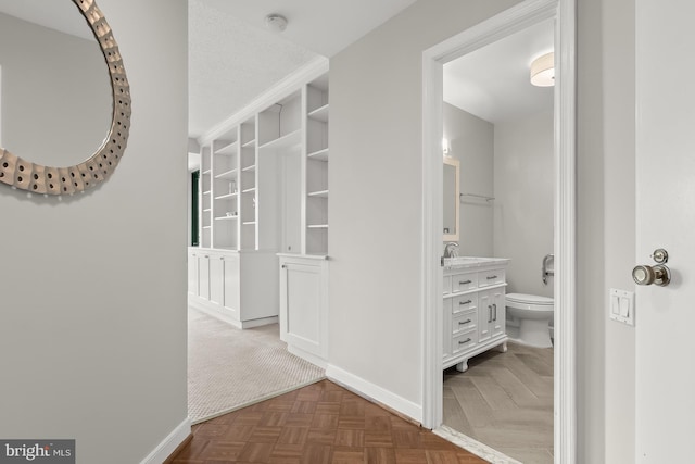 955 26th St NW Unit 510, Washington, DC 20037 - corridor featuring baseboards and a sink