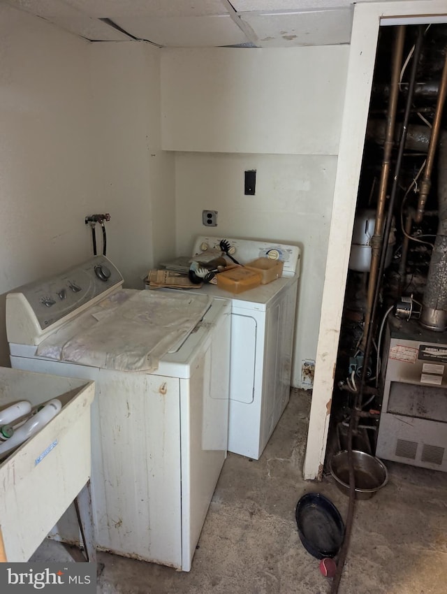 2812 6th NE, Washington, DC 20017 - laundry room featuring independent washer and dryer and a heating unit