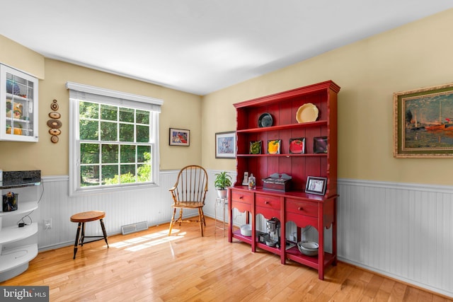 6162 Commadore Ct, Columbia, MD 21045 - living area with wainscoting and hardwood / wood-style floors