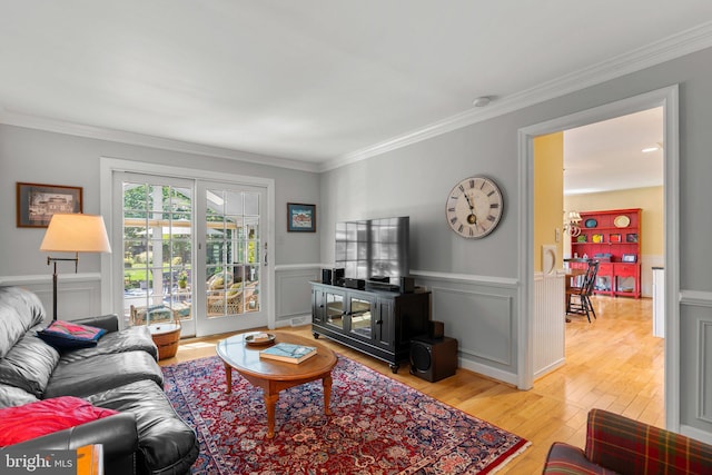 6162 Commadore Ct, Columbia, MD 21045 - living room featuring ornamental molding, hardwood / wood-style flooring, wainscoting, and a decorative wall