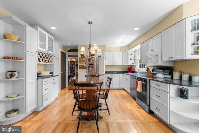 6162 Commadore Ct, Columbia, MD 21045 - kitchen featuring open shelves, appliances with stainless steel finishes, a chandelier, dark countertops, and recessed lighting