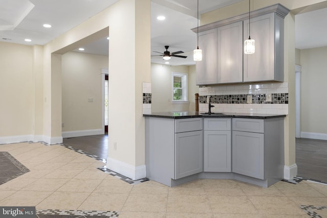 1432 Frush Valley Rd, Reading, PA 19605 - kitchen featuring gray cabinetry, ceiling fan, dark countertops, decorative backsplash, and recessed lighting