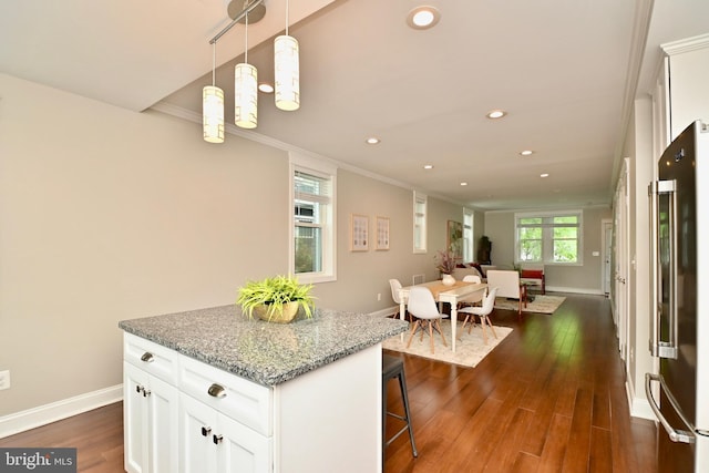 1103 Morse St NE, Washington, DC 20002 - kitchen with high end fridge, crown molding, recessed lighting, white cabinetry, and dark wood-style flooring