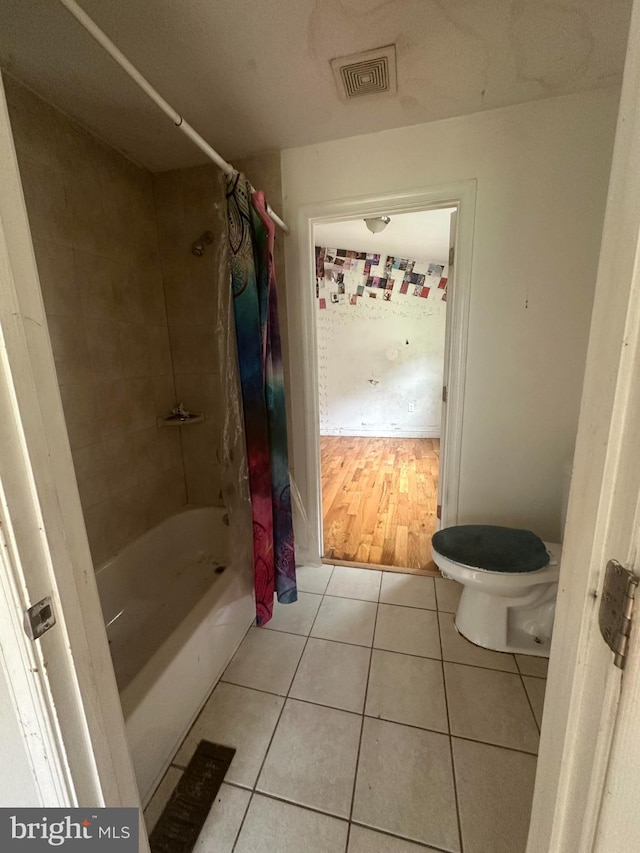 3709 Chesholm Rd, Baltimore, MD 21216 - full bath featuring tile patterned flooring and shower / bath combination with curtain