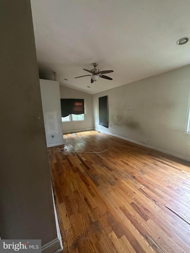 3709 Chesholm Rd, Baltimore, MD 21216 - unfurnished room featuring wood finished floors, vaulted ceiling, and ceiling fan