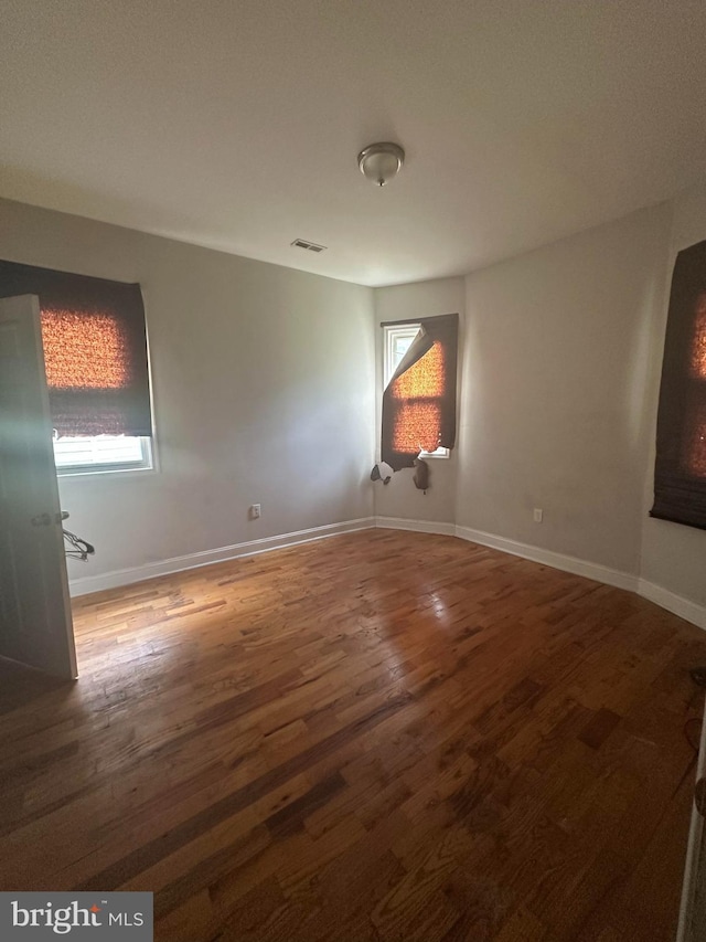 3709 Chesholm Rd, Baltimore, MD 21216 - spare room featuring wood finished floors and baseboards