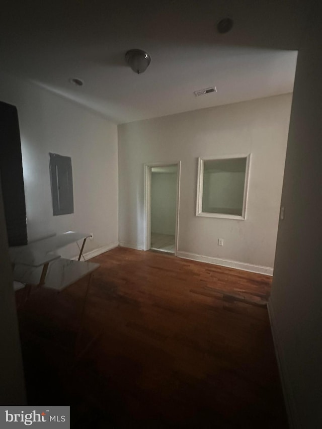3709 Chesholm Rd, Baltimore, MD 21216 - empty room featuring electric panel and wood finished floors