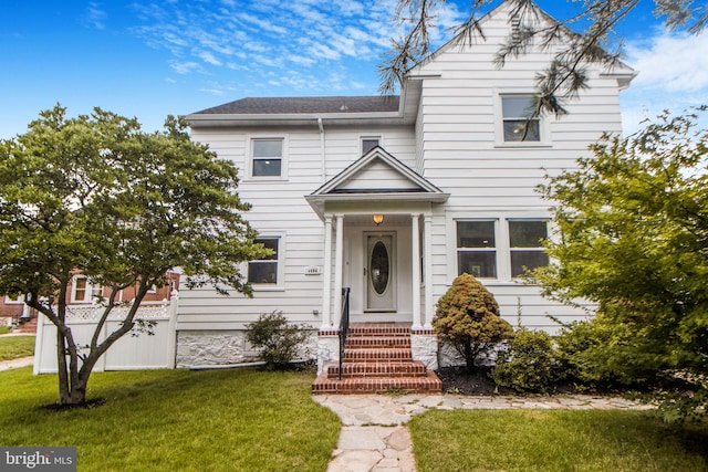 4404 Carleview Rd, Baltimore, MD 21207 - view of front of property with a front yard and a shingled roof