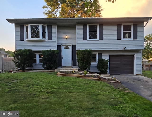 2334 Maytime Dr, Gambrills, MD 21054 - raised ranch with an attached garage and asphalt driveway