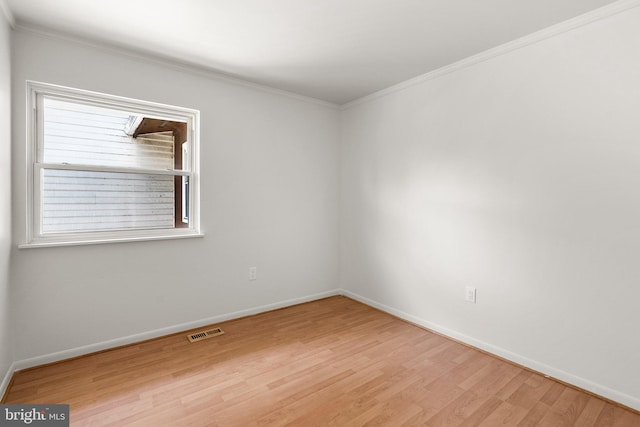52 Anna Ct Unit 275, Gaithersburg, MD 20877 - empty room with ornamental molding and wood finished floors