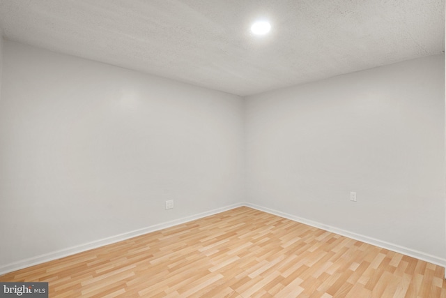 52 Anna Ct Unit 275, Gaithersburg, MD 20877 - spare room featuring wood finished floors, a textured ceiling, and recessed lighting