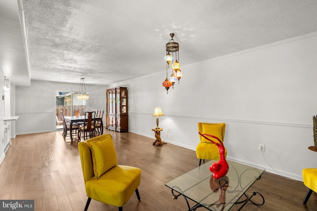 52 Anna Ct Unit 275, Gaithersburg, MD 20877 - living room with a textured ceiling and wood finished floors