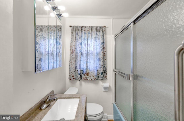 3533 Chestnut St, Reading, PA 19605 - bathroom featuring vanity and shower / bath combination with glass door