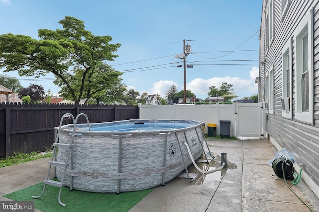 531 Redfern St, Hamilton, NJ 08610 - fenced backyard featuring a gate and a patio area