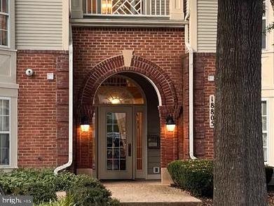 18805 Sparkling Water Dr Unit 7/201, Germantown, MD 20874 - property entrance featuring brick siding